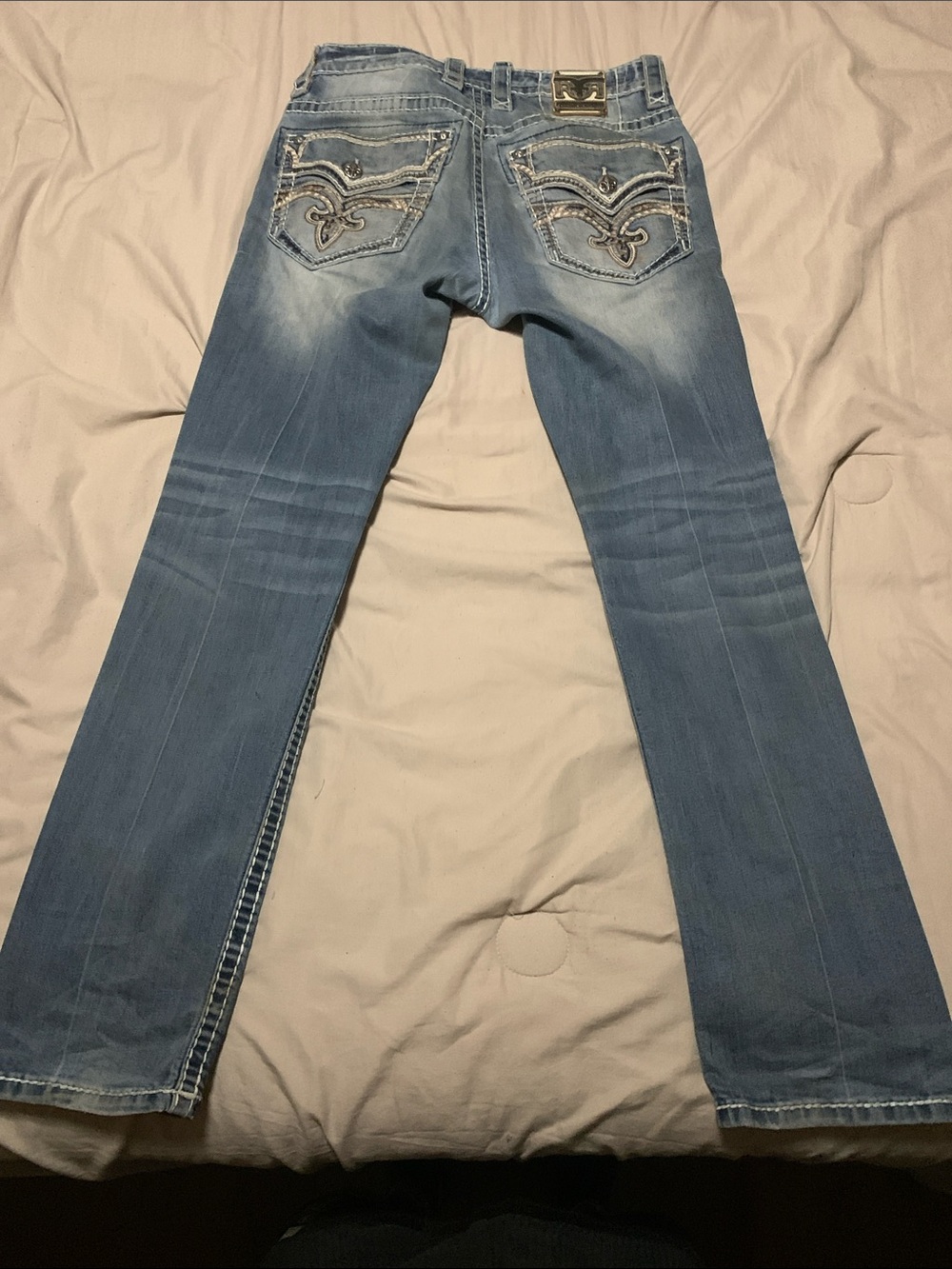 Rock Revival Men’s Light Blue Slim Straight Jeans with Embroidered Back Pockets